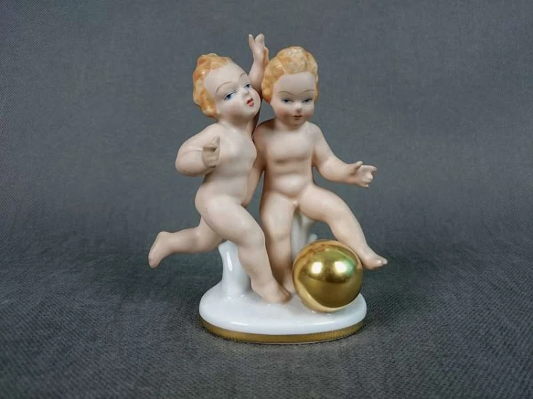 Porcelana Gerold - Dwa putta ze złotą kulą Okaz !!!