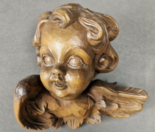 Duża głowa amora - Rzeźba w drewnie