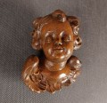 Uskrzydlone putto patrzące w prawo - Rzeźba ręcznie wykonana