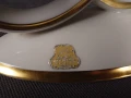 Oryginalna papierowa nalepka fabryczna Lindner na białej porcelanie