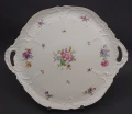 Porcelanowa patera ażurowa Rosenthal Sanssouci z dużym bukietem kwiatowym i złotym brzegiem na czarnym tle