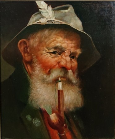 Portret górala ujęty w kadrze bez dolnego pasma ramy, prezentujący głębię kolorytu twarzy
