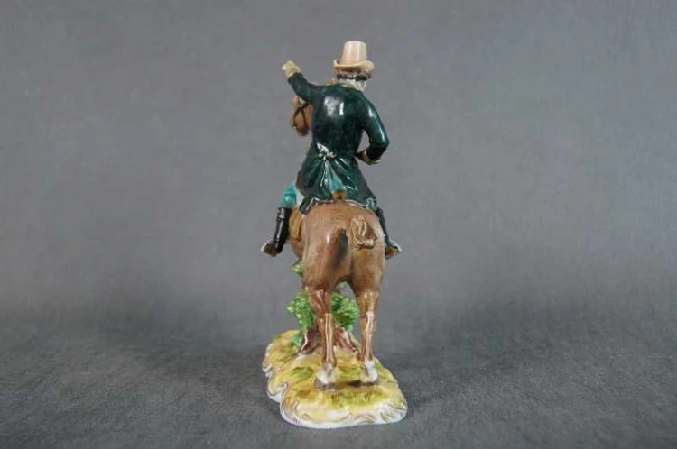 Jeździec na koniu stara porcelanowa figura
