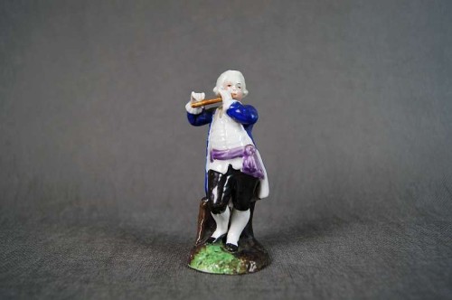 Mozart młody muzyk porcelanowa figurka