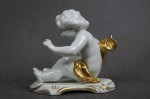 Kolekcjonerska porcelana figura baraszkujący amorek nr.2