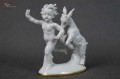 Porcelana Carl Scheidig Figurka Rozbawiony malec z koziołkiem Cudo !!!