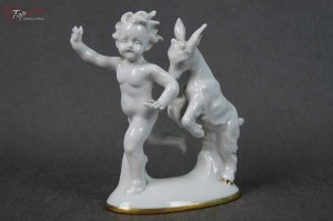 Porcelana Carl Scheidig Figurka Rozbawiony malec z koziołkiem Cudo !!!